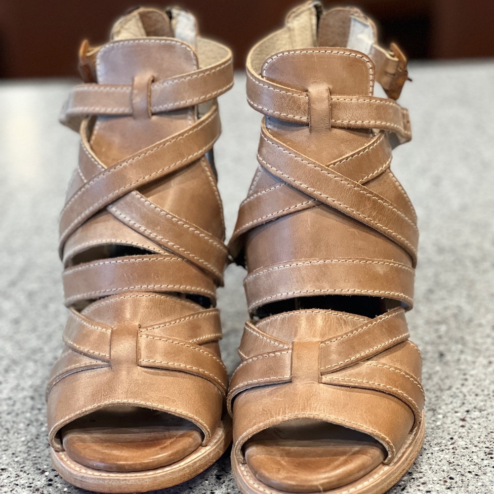 Brand new never worn. Taupe and they run true to size.